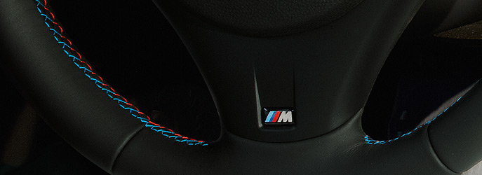 img-316579-5-02_m_steering_wheel_closeup.jpg