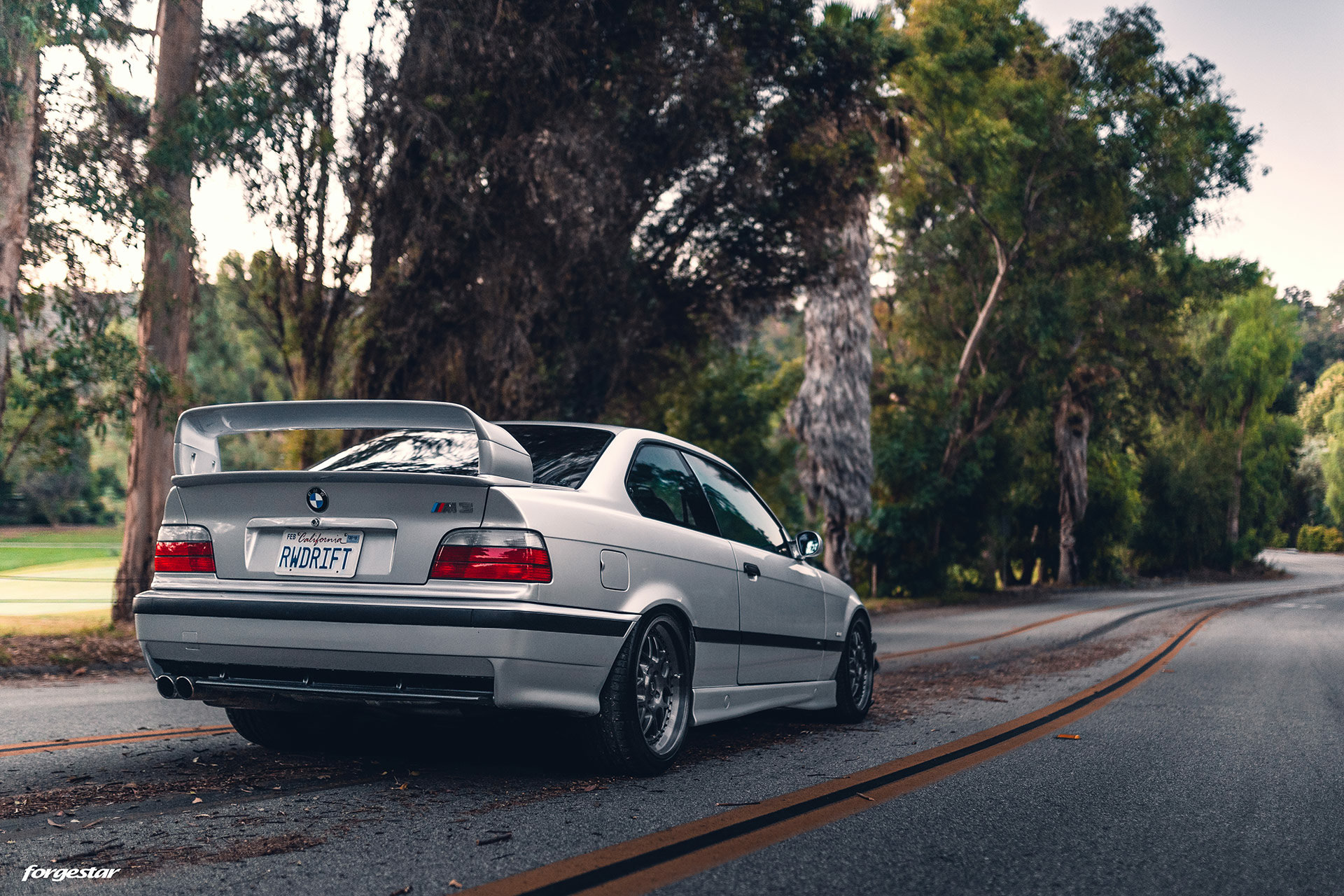 arctic-silver-metallic-bmw-e36-m3-lightweight-aftermarket-forgestar-wheels-l.jpg